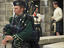 Costumed interpreters and a bagpipe player, Halifax Citadel National Historic Site.