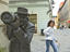 The Photographer, life-size bronze statue, Laurinska Street.