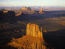 Aerial overlook of West Mitten Butte in Monument Valley at sunset.