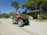 Woman travelling on a quad bike.