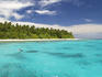 People snorkelling in the clear waters off an island in the Vava'u Group.