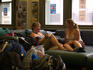 Backpackers relax in the lounge at Base ACB.