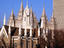 Assembly Hall and  Salt Lake Temple inside Temple Square with  world headquarters for Church of Jesus Christ of Latter-Day Saints in background.