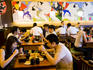Diners at Ajisen, a popular Japanese food cafe, French Concession.