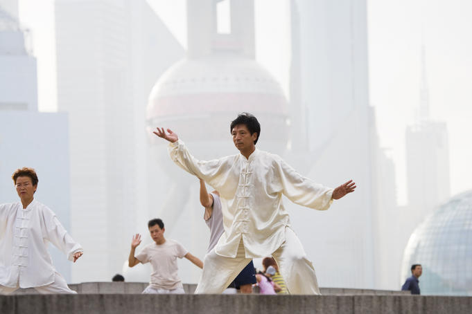 Performing tai chi on the Bund.