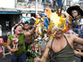 Masked man with burning torch and ecstatic woman - participants at Santo Nino festival, Tondo district.