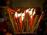 Burning incense sticks at Man Mo Temple.
