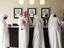 Men checking in to a hotel at Dubai Marina.