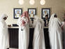 Men checking in to a hotel at Dubai Marina.