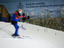 Woman skiing at Ski Dubai indoor ski resort, located in Mall of the Emirates shopping mall.