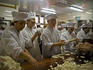 Staff making dumplings at restaurant in Yuyuan Bazaar in Old Town.
