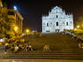 Sitting on the steps below Church of St Paul ruins, at night.