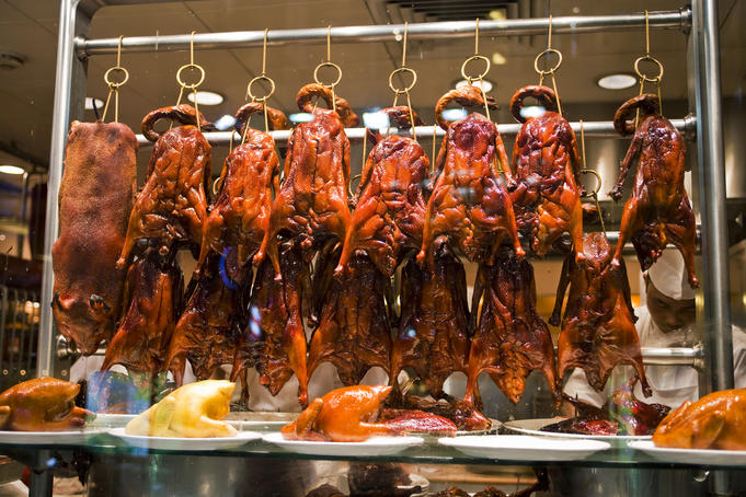 Display of roast duck, roast pig and roast chicken, Yung Kee Restaurant.