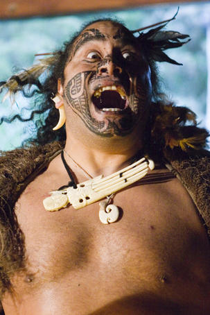 Portrait of Maori man performing at Mitai Maori Village.