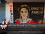 Shutters rolled down at Aswathy Jewellery shop.