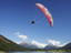 Paramotor soaring over Diamond Lake, Queenstown region.