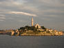 Rovinj town with Cathedral of St Euphemia on hilltop at sunset.