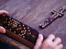 Playing dominoes, a tile game
