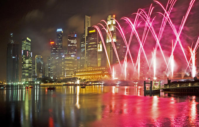 City buildings and fireworks celebrating Chinese New Year.