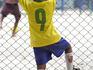 Young soccer player watching and waiting.