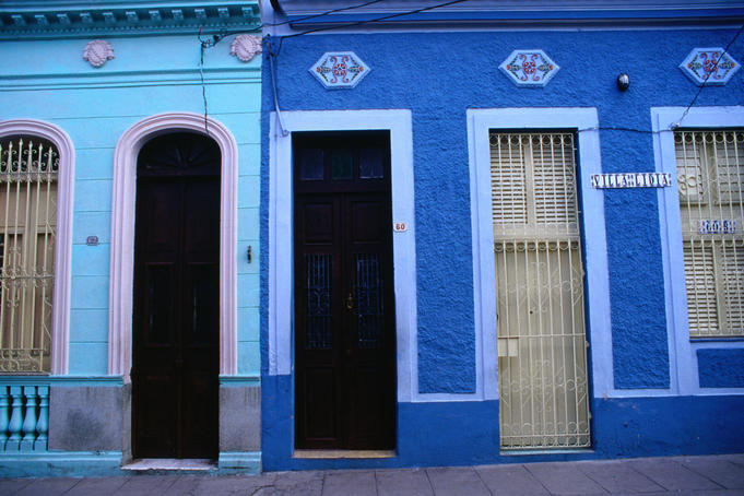 Doors in the colourful blue buildings of Santa Clara near the city centre