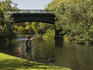 Fishing on north bank of River Torrens, with heritage-listed Albert Bridge in background.