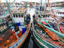 Fishing boats at pier.