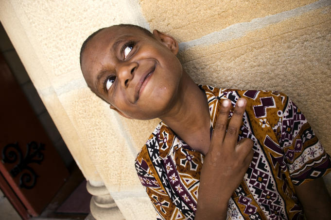Portrait of boy at Catholic cathedral.