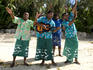 Staff playing welcome songs at Beachcomber Island.
