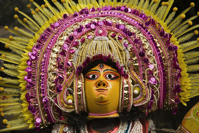 Bengali Chhau dancer wearing a mask at the Crafts Museum.