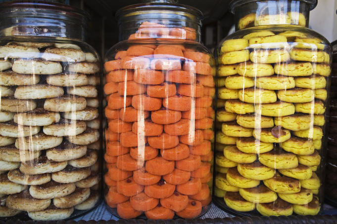 Glass jars with cookies in Kumily market.