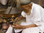 Uighur coppersmith, China