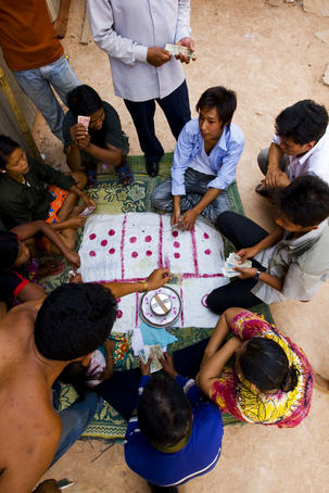 Group of people gambling.