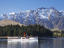 TSS Earnslaw sailing on Lake Wakatipu, with The Remarkables in background.