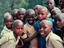 A group of clean shaven school children in a village in Western Rwanda