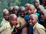 A group of clean shaven school children in a village in Western Rwanda