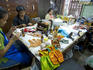 Workers making dolls at the Bangkok Doll Factory and Museum.