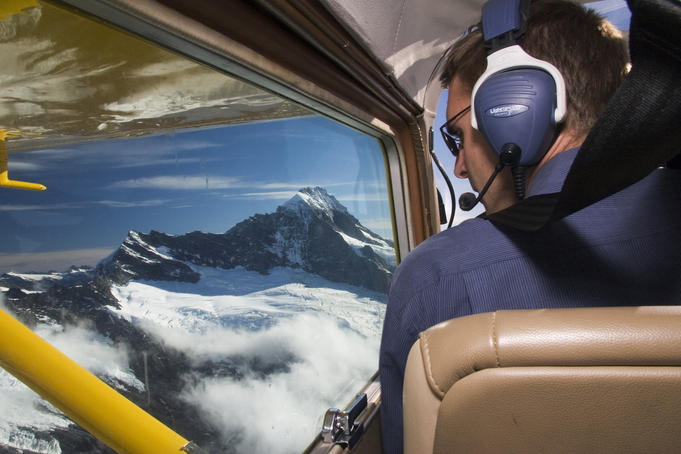 Cockpit of small plane over Milford Sound.