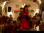 Flamenco dancer performing for tourists in Sacromonte Caves.