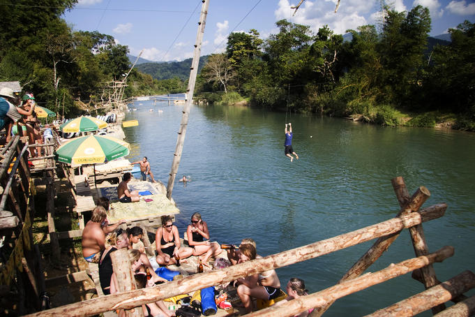 Tourists by river.