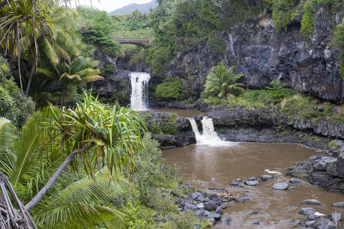 The pools of Oheo Gulch tinted brown due to an upcountry landslide and closed for swimming due to flash floods - requested pic was for swimmers in the pools. East Maui, beyond Hana.