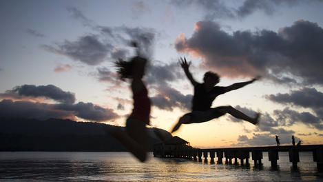 Sunset jumpers at Hanalei Beach.