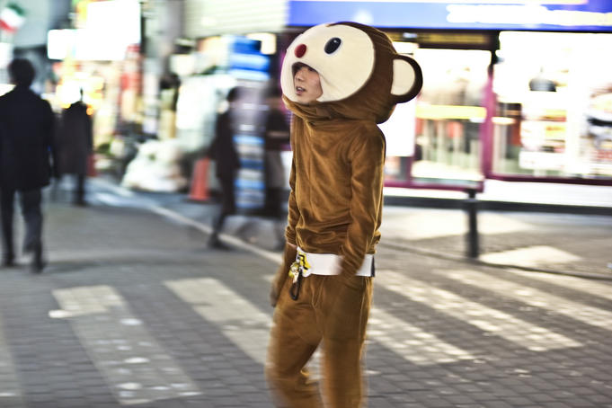 Promoter in animal costume on street crossing, Ikebukuro district.
