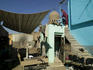 Woman cleaning her house in the Northern Cemetery, Bab el Nasr.