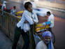 Rickshaw pullers having a break on streets of Delhi.