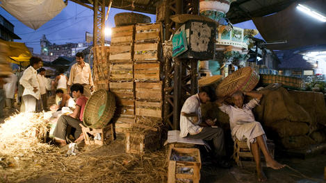 Fruit sellers at Crawford Market relaxing in the evening.
