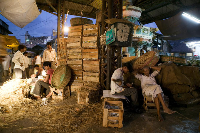 Fruit sellers at Crawford Market relaxing in the evening.