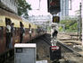 Passengers on board the crammed train service near Howrah Station.