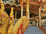 Gold nagas at the entrance to a Buddhist monastery.
