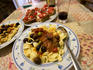Pasta with olives and sauce.